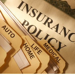 Insurance policy documents and folders