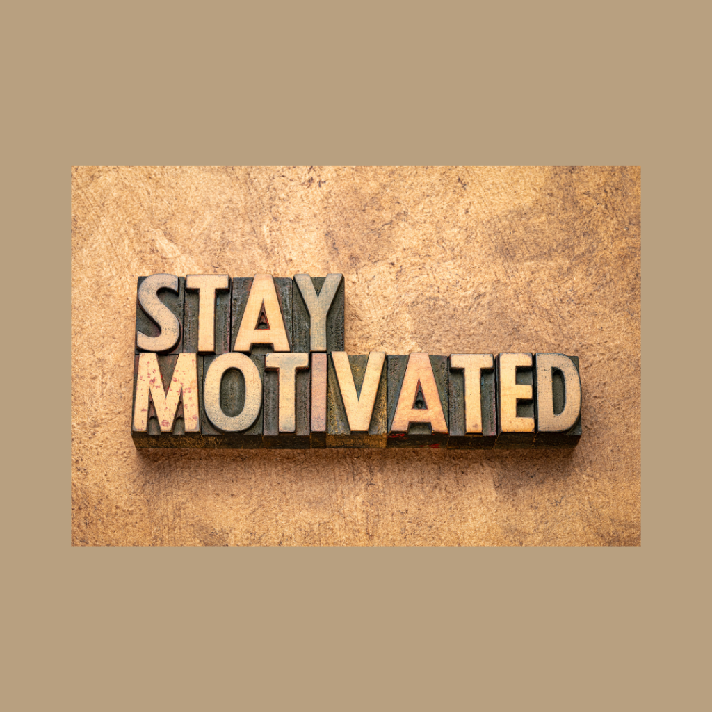 Stay motivated sign for how to stay motivated while paying off debt