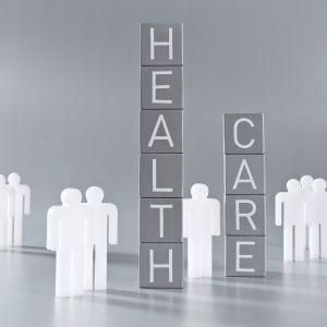 Blocks spelling health care with figures