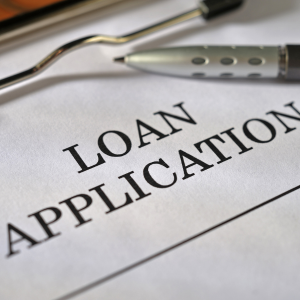 Loan application form with pen