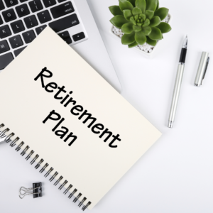 notepad on top of lap top for retirement strategies that don't get talked about enough