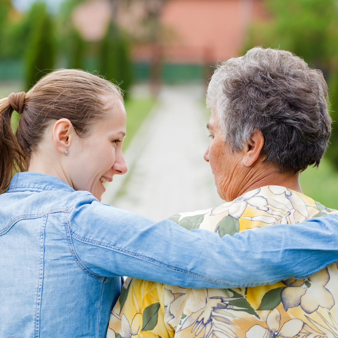 a daughter has her arms around her mother for supporting your parents financially