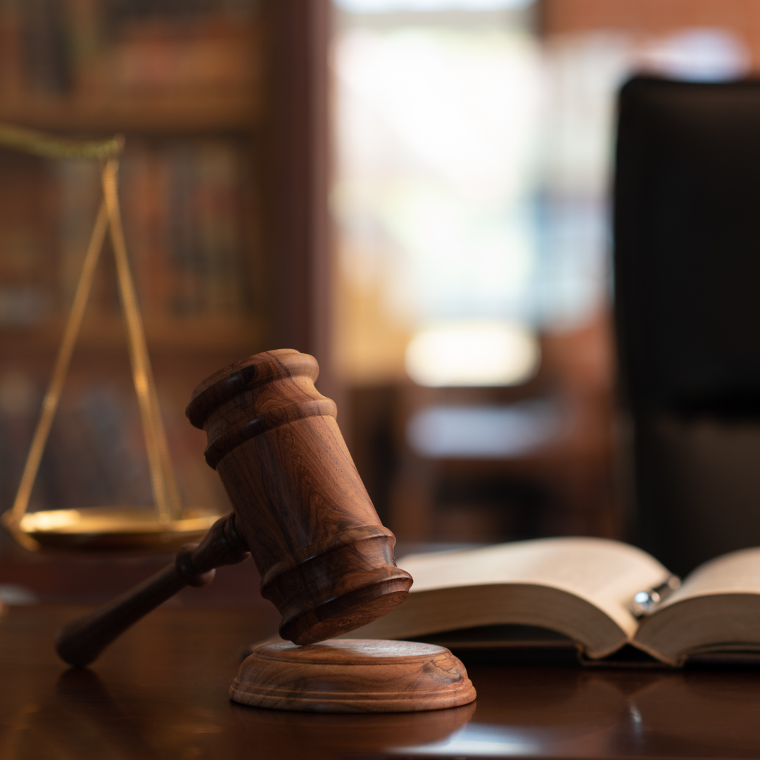 Gavel, scales, and open book for how to avoid probate in Ontario